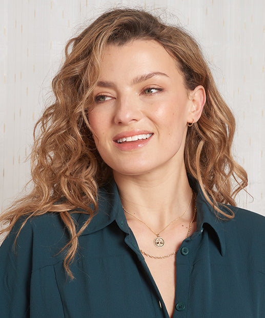 model wearing gold jewellery from silverage gold collection
