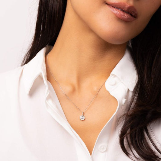 Model wearing Bezel Set Diamond Cluster Pendant in 9ct White Gold gp2352, featuring a stunning cluster of bezel-set diamonds in a sleek white gold setting, perfect for adding elegance and brilliance to any outfit.