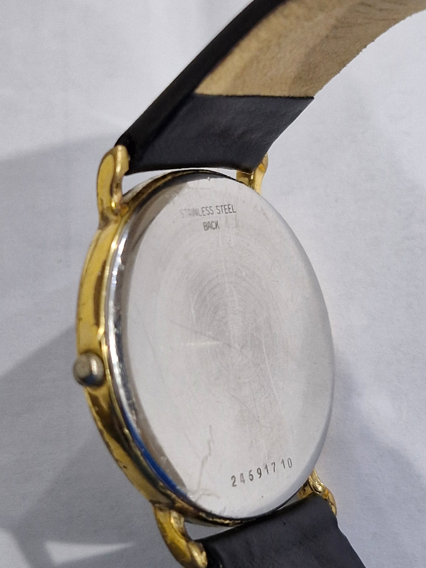 Case back of Longines Presence vintage watch with serial number engraving