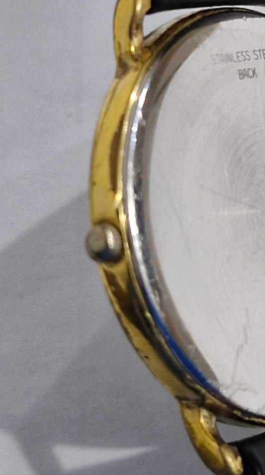 Gold-plated case and crown of Longines Presence vintage quartz watch