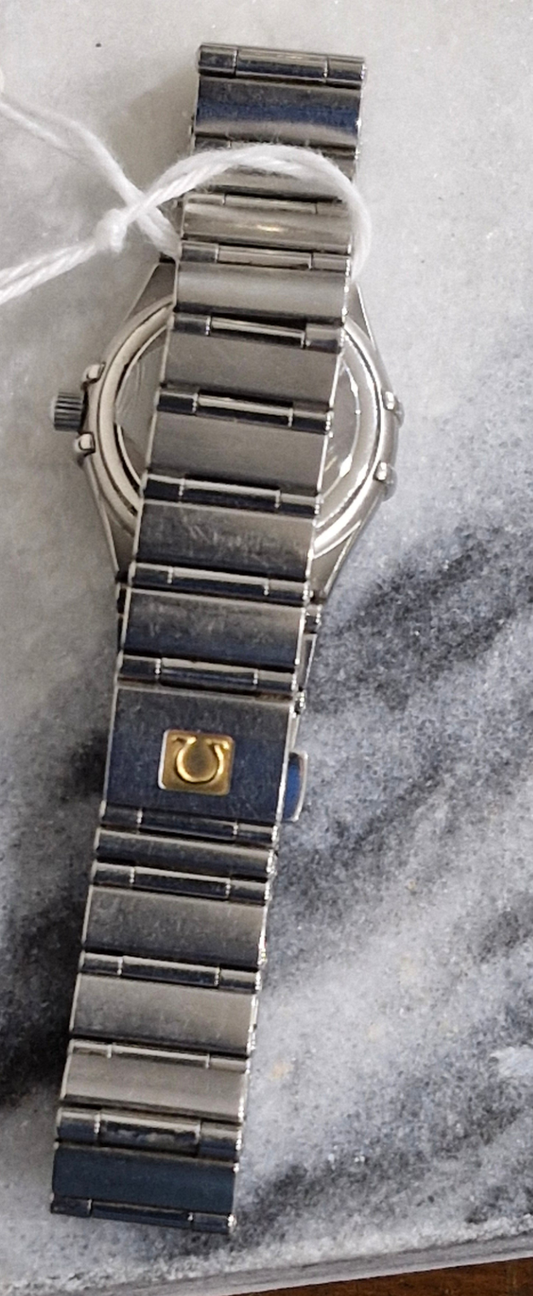 Pre-owned Omega Constellation Quartz 26mm women's stainless steel watch with silver dial showing back strap and logo