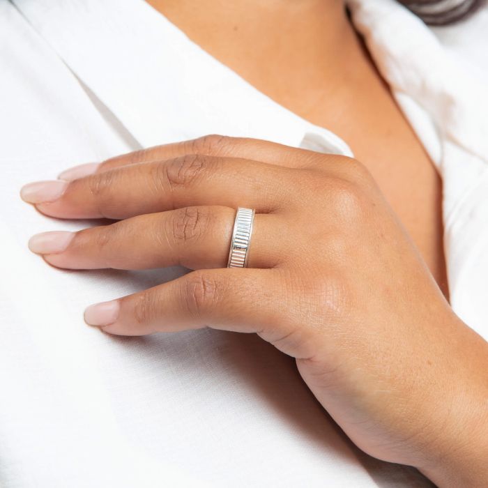 Model wearing Ridged Silver Spinner Ring r3903, featuring a stylish ridged design with a rotating inner band, perfect for adding a modern and unique touch to any jewelry collection.