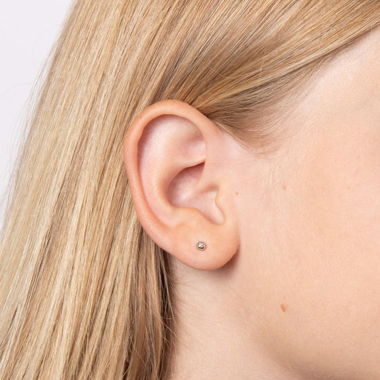 Side view of Starburst Silver Stud Earrings with Diamonds