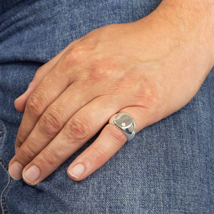 Model wearing Men's Silver Signet Ring with Cubic Zirconia r3766c, featuring a bold and modern design with a sparkling cubic zirconia accent, perfect for adding sophistication and style to any outfit.