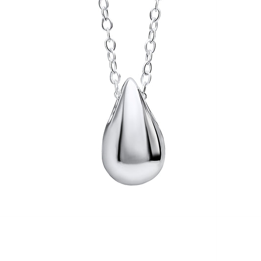 A polished silver teardrop pendant necklace close up. shown against a solid white background.
