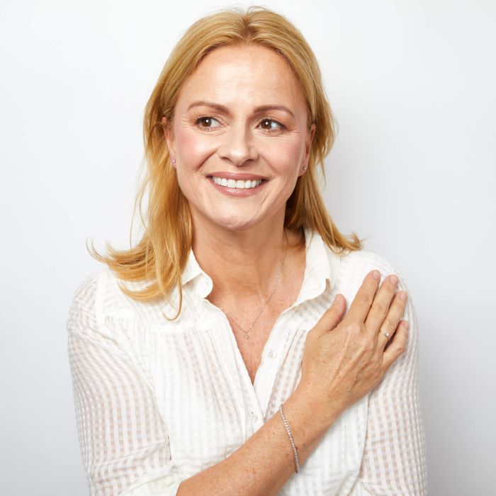 Lady wearing a Thin Elegant Mini Diamond and White Gold Tennis Bracelet