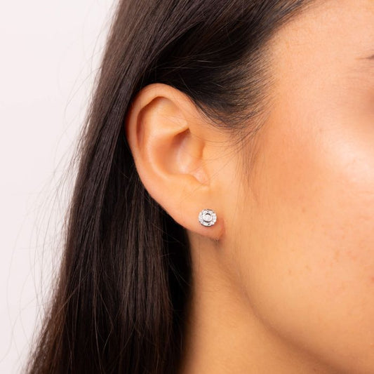 close up of ear wearing Bezel Set Diamond Cluster Stud Earrings in 9ct Gold