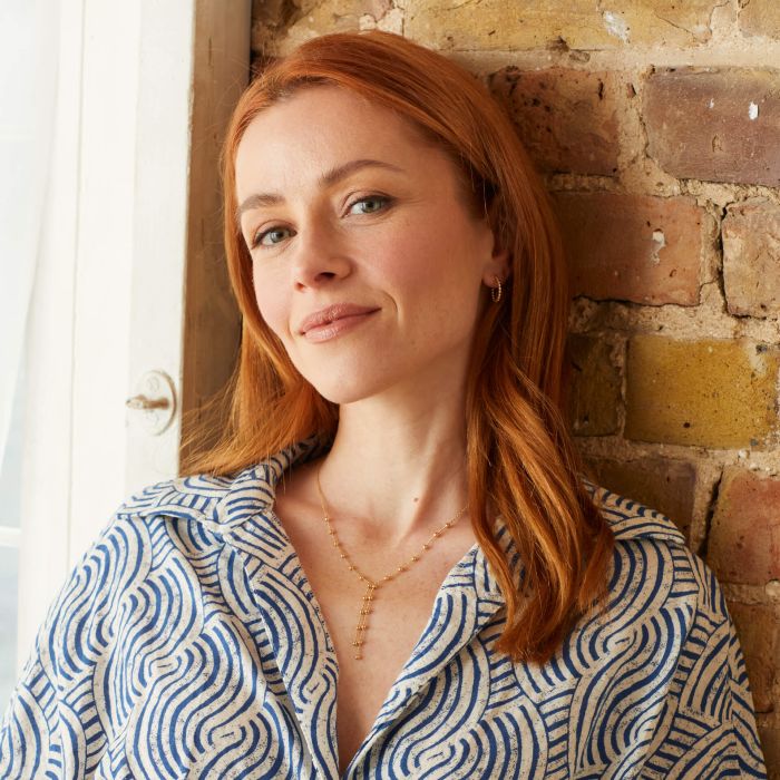 person wearing silverage necklace jewellery 