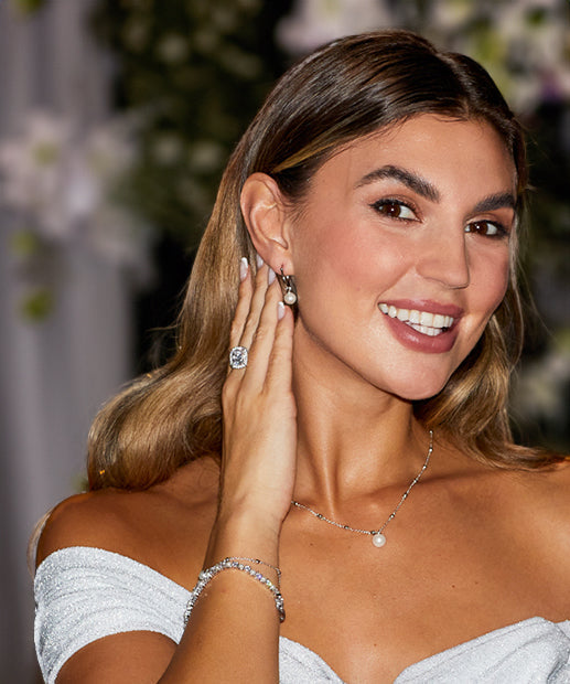 model bride wearing pearl jewelry set