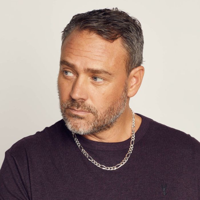 male model wearing silver chain necklace 