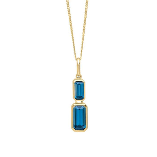 Elongated Gold Pendant Topaz Necklace on white background