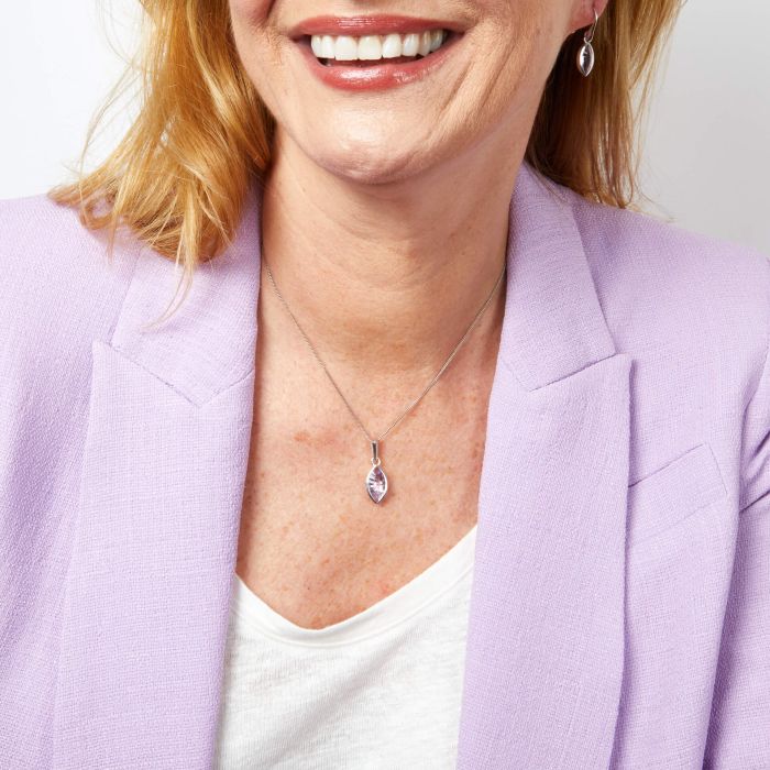 Model wearing Fiorelli Concave Cut Amethyst Pendant p5427m, featuring an elegant concave-cut amethyst stone in a sleek and sophisticated design, perfect for adding vibrant color and refinement to any outfit.