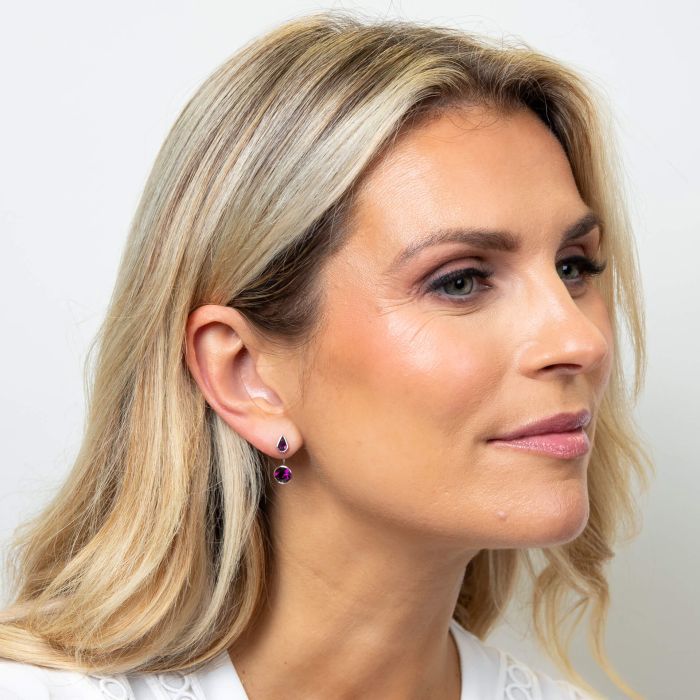 Model wearing Fiorelli Front and Back Earrings with Pear and Round Crystal Shapes e6507m elegent siple ideal for stacking 