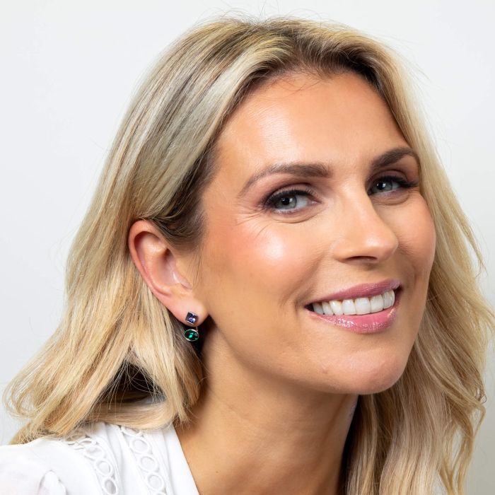 Model wearing Fiorelli Front and Back Earrings with Square and Round Crystal Shapes e6508 featuring a versatile design crafted from sterling silver with sparkling crystals, perfect for customizable and elegant jewelry styling