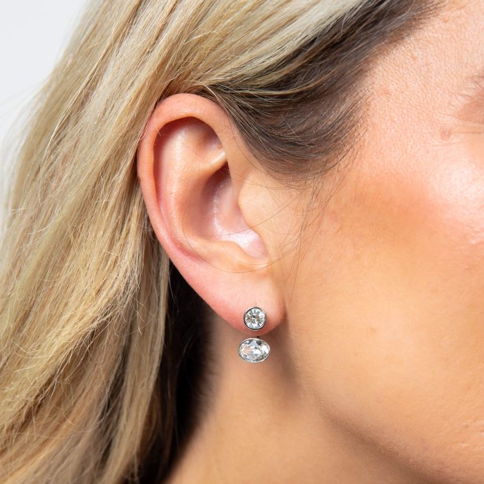 Model wearing Fiorelli Front and Back Earrings with Oval and Round Crystal Shapes e6462c, featuring a stylish and versatile design with sparkling oval and round crystals, perfect for elegant and customizable jewelry looks.
