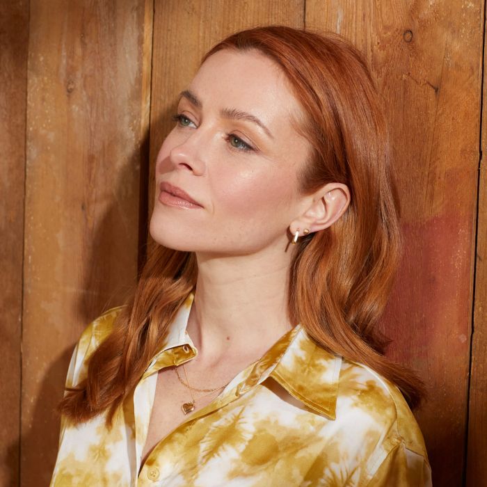 Model wearing Gold necklace and earring stacking ge1002_ge2468_gp2357_gn366_feature