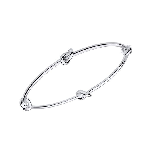 Silver love knot bangle bracelet with a knot design on a white background