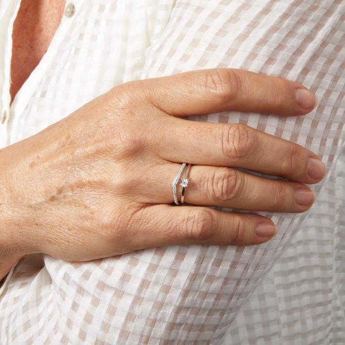 Model wearing Micro Diamond Set V-Shaped Ring in 9ct Gold gr630 and gr628, featuring a delicate V-shaped design with sparkling micro-set diamonds, perfect for adding elegance and sophistication to any jewelry collection.