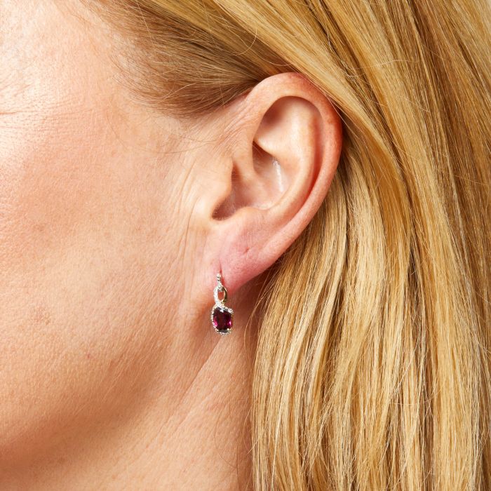 Side view of one Elegant Twist Garnet Drop Earring in 9ct Gold