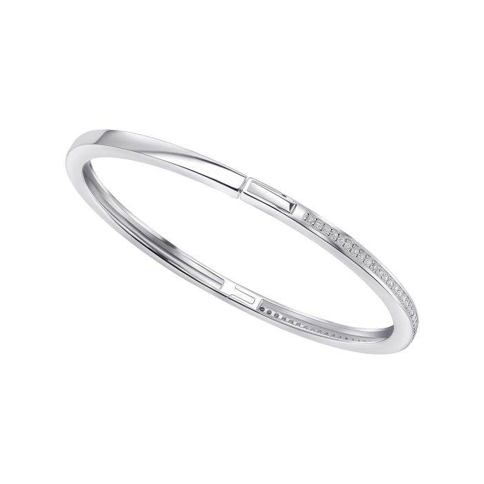 Silver bangle bracelet with small row of shimmering cubic zirconia on a white background