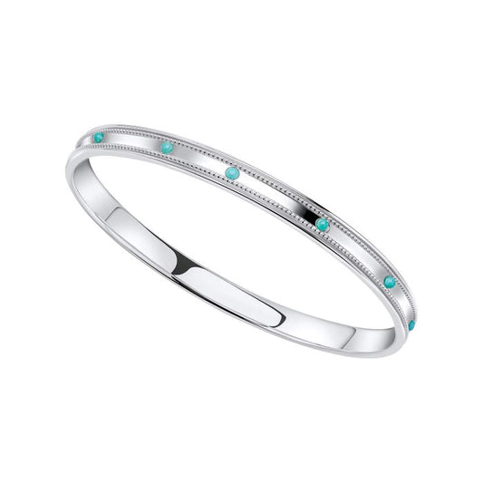 Silver bracelet with turquoise stones on a white background