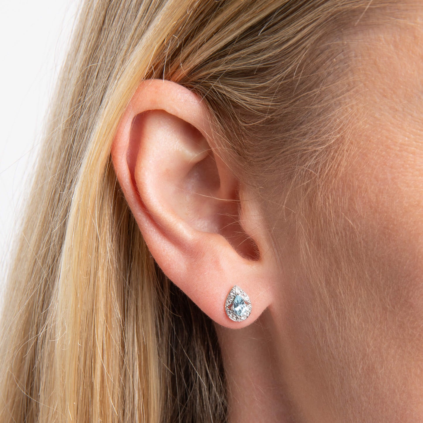close up of ear 9ct White Gold Aquamarine & White Topaz Art Deco stud earring