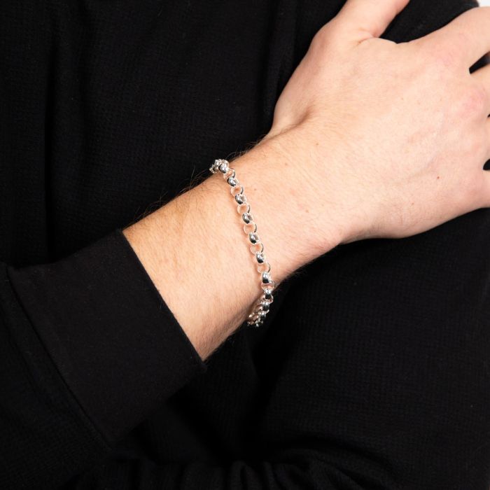 Silver Belcher Chain Bracelet on a wrist with a black background
